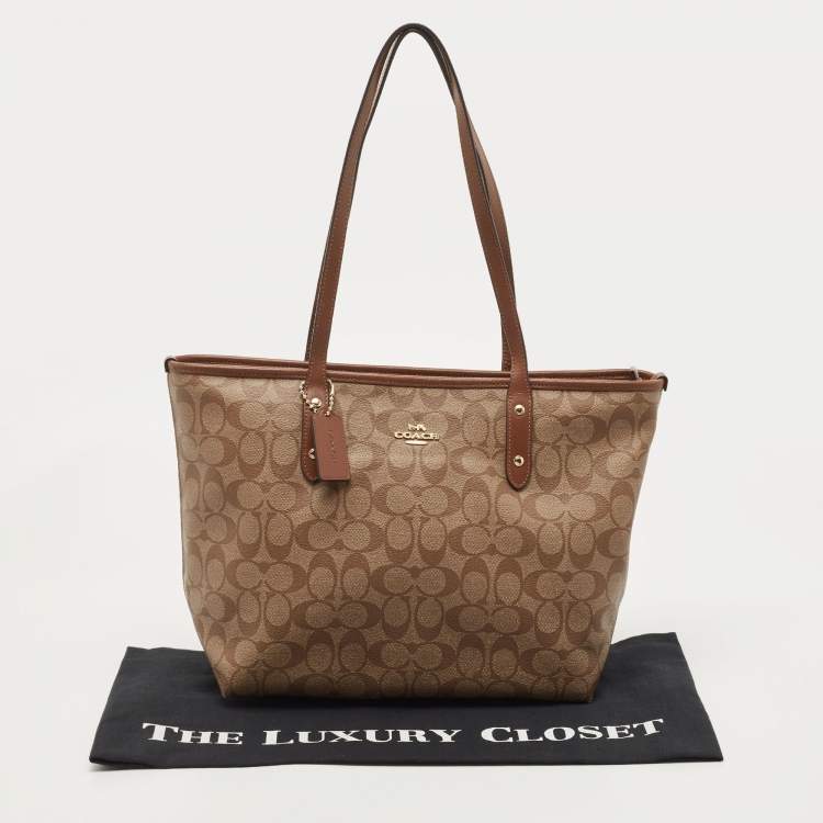 مملوكة مسبقًا Coach Beige/Brown Signature Coated Canvas and Leather City Zip Tote
