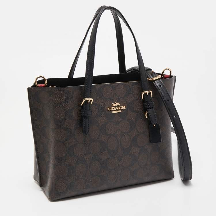 Pre Owned Coach Brown/Black Signature Coated Canvas Tatum Caryall Tote