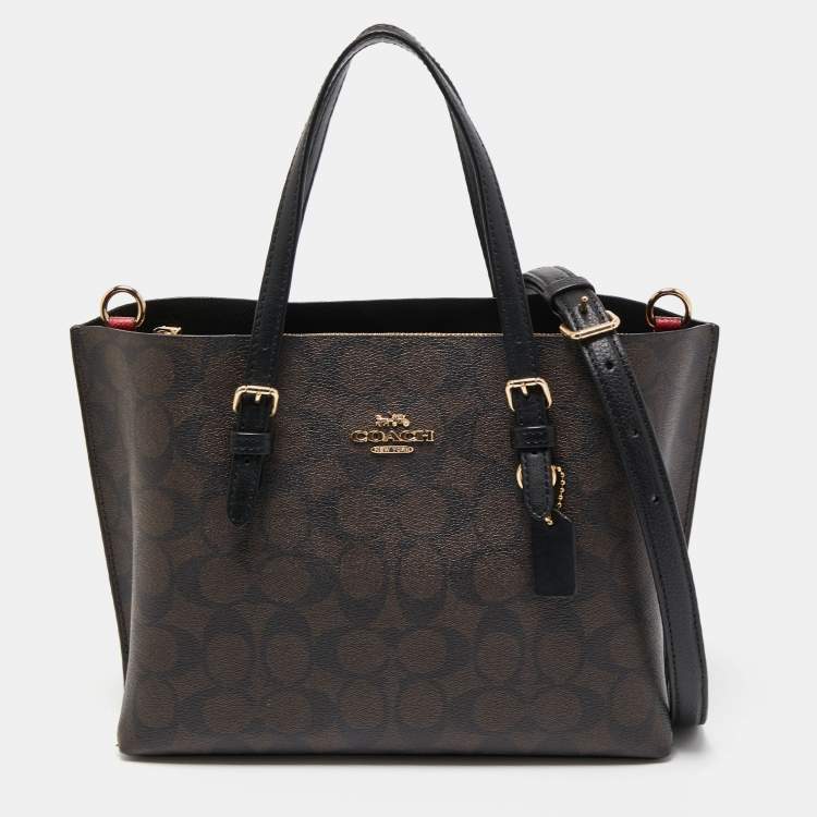 Pre Owned Coach Brown/Black Signature Coated Canvas Tatum Caryall Tote