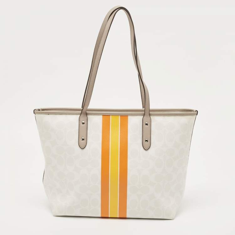 Pre Owned Coach White/Taupe Signature Coated Canvas and Leather City Tote