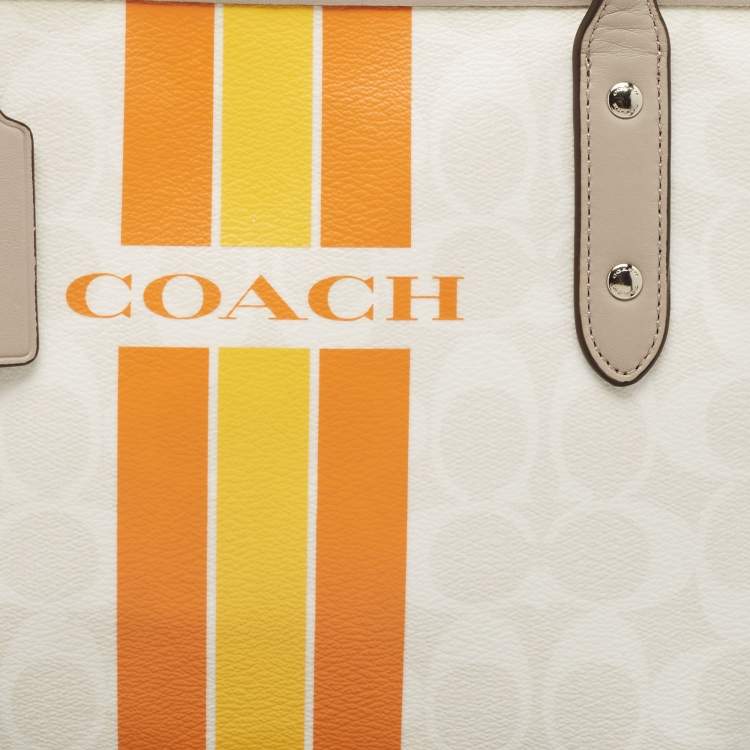 Pre Owned Coach White/Taupe Signature Coated Canvas and Leather City Tote