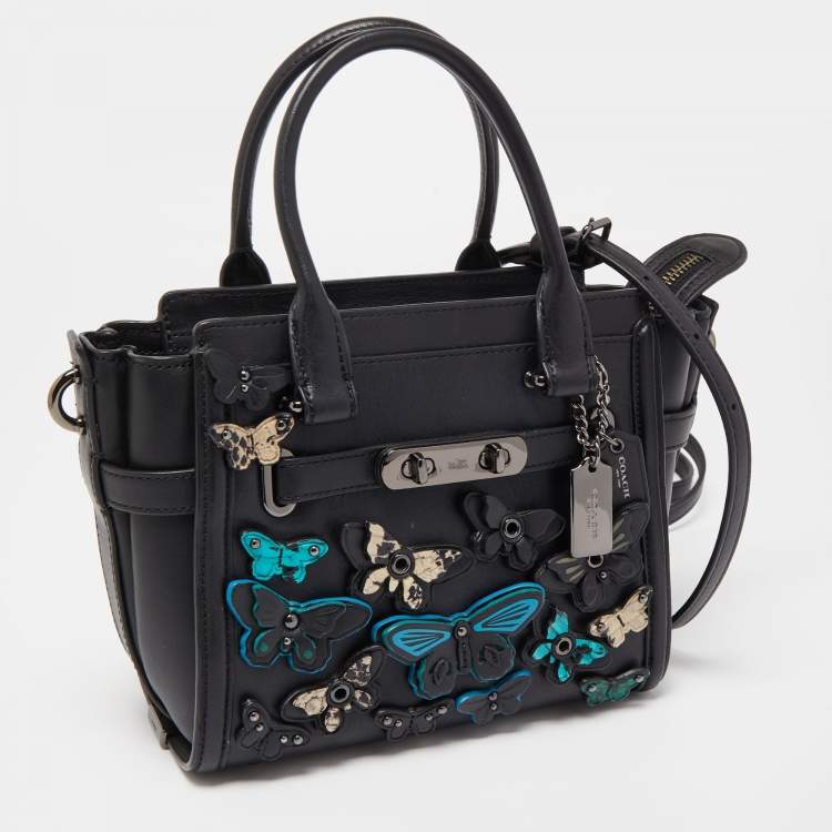 Pre Owned Coach Black Leather Butterfly Embellished Swagger 20 Carryall Top Handle Bag