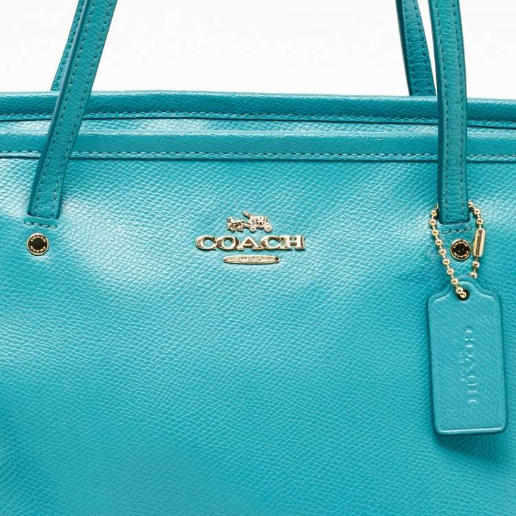 Pre Owned Coach Turquoise Blue Leather Street Zip Tote