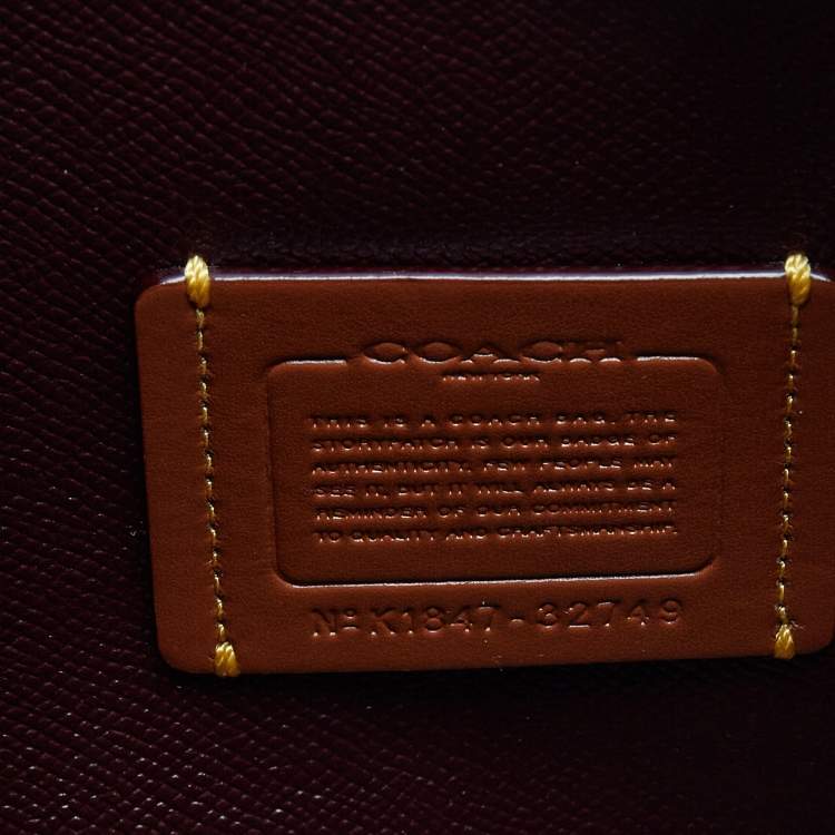 Pre Owned Coach Beige/Brown Signature Coated Canvas and Leather Charlie Satchel