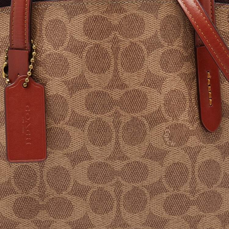 Pre Owned Coach Beige/Brown Signature Coated Canvas and Leather Charlie Satchel