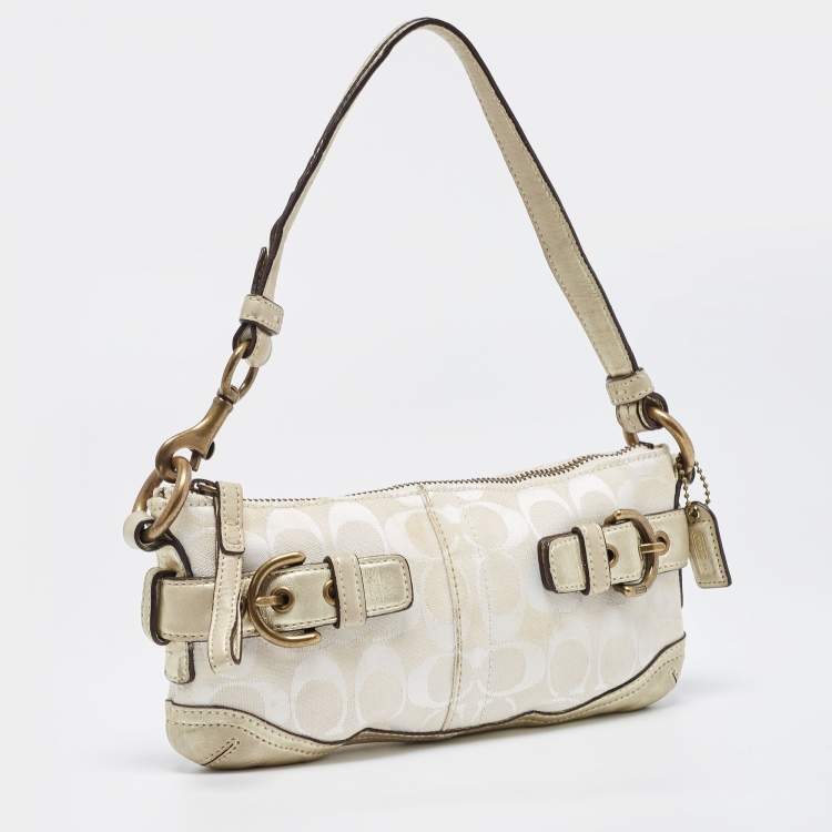 Pre Owned Coach Pale Gold/Beige Signature Canvas and Leather Baguette 