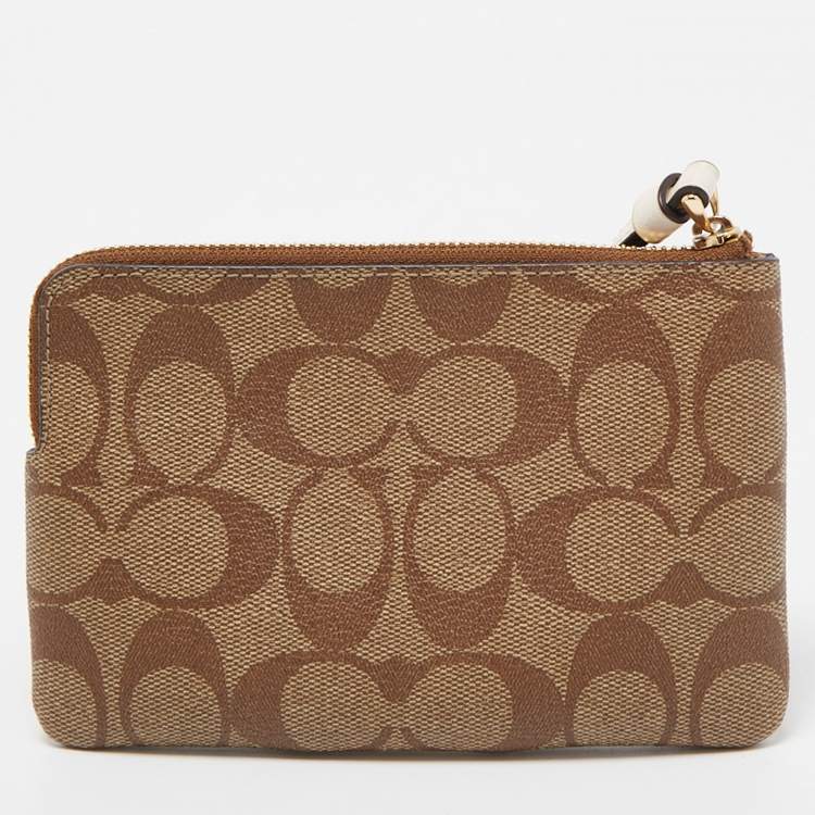Pre Owned Coach Beige Signature Canvas and Leather Corner Zip Wristlet