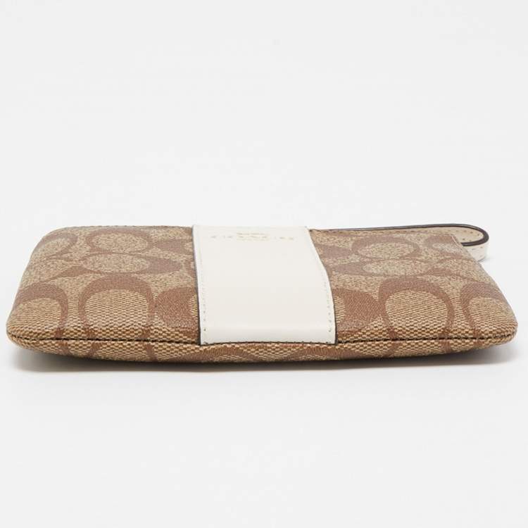 Pre Owned Coach Beige Signature Canvas and Leather Corner Zip Wristlet
