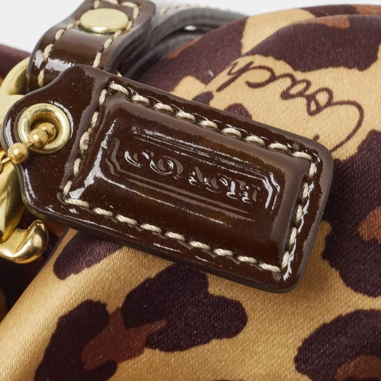 Pre Owned Coach Gold Leopard Print Satin Ocelot Kisslock Wristlet Clutch