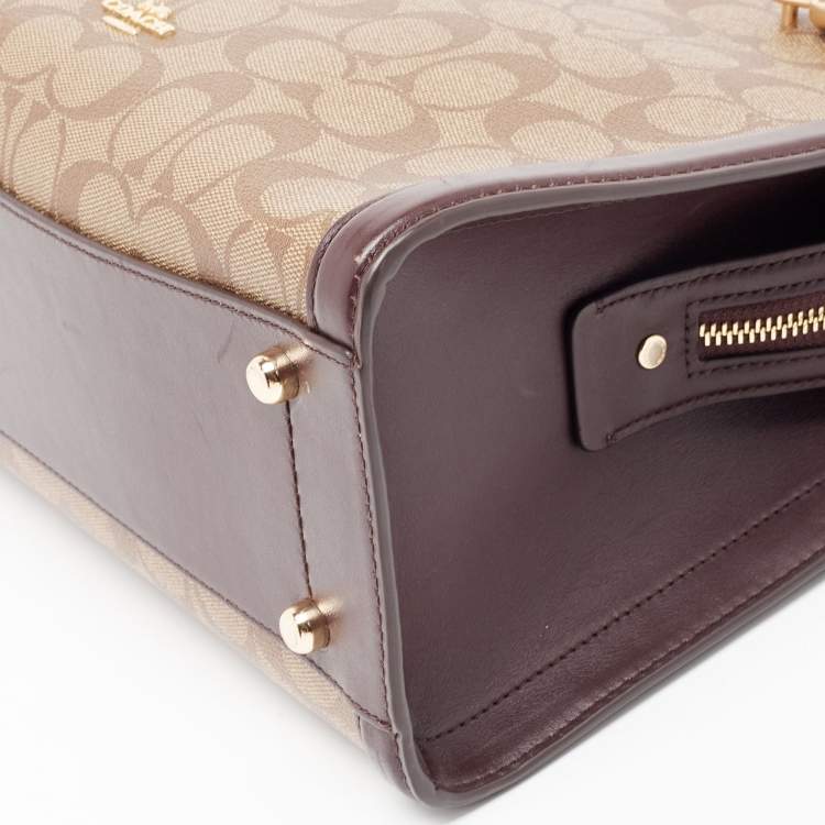 Pre Owned Coach Burgundy/Beige Signature Coated and Leather Zoe Carryall Tote