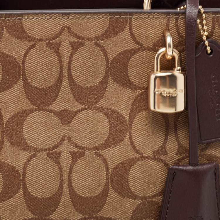 Pre Owned Coach Burgundy/Beige Signature Coated and Leather Zoe Carryall Tote