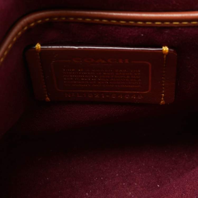 Pre Owned Coach Brown/Beige Signature Coated Canvas and Leather Parker Shoulder Bag