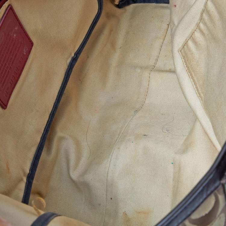 Pre Owned Coach Beige/Brown Signature Canvas and Leather Shopper Tote