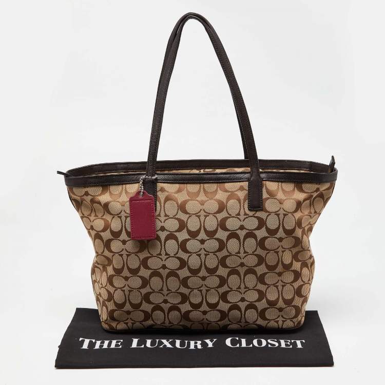 Pre Owned Coach Beige/Brown Signature Canvas and Leather Shopper Tote