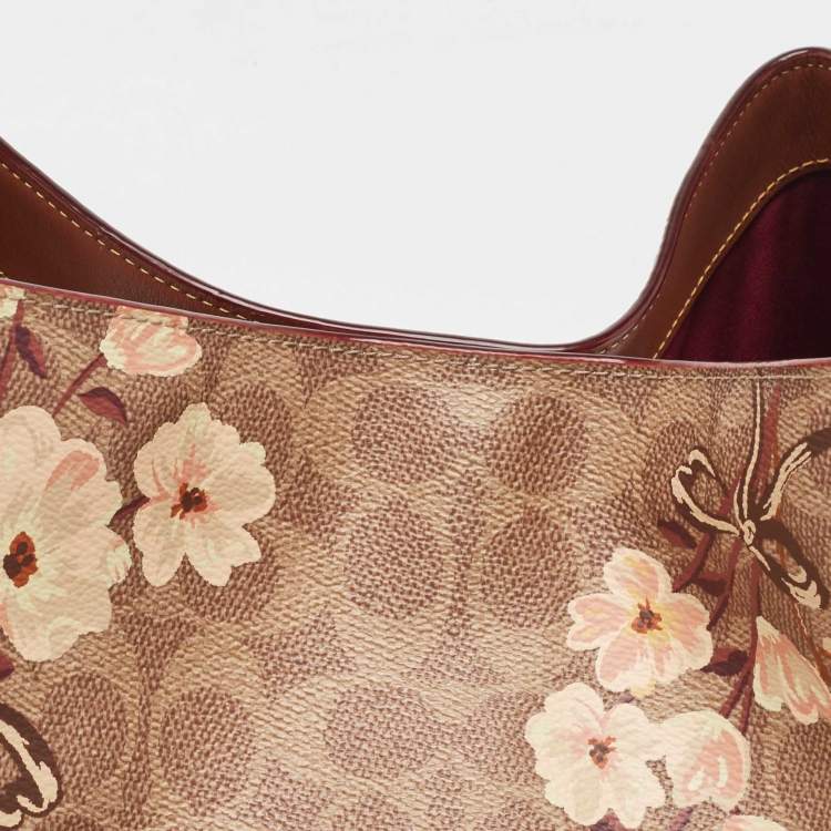 Pre Owned Coach Beige/Brown Signature Prairie Floral Canvas and Leather Edie 31 Satchel
