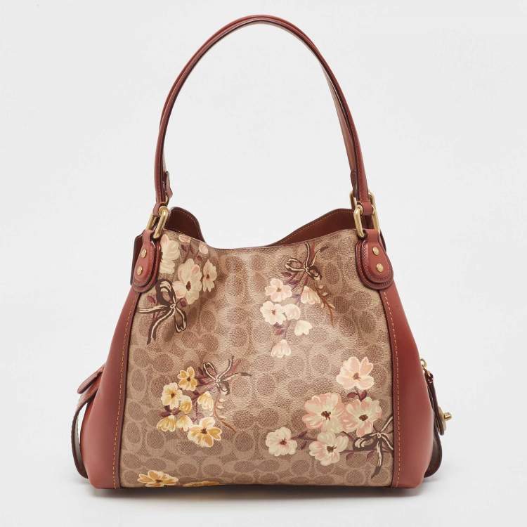 Pre Owned Coach Beige/Brown Signature Prairie Floral Canvas and Leather Edie 31 Satchel