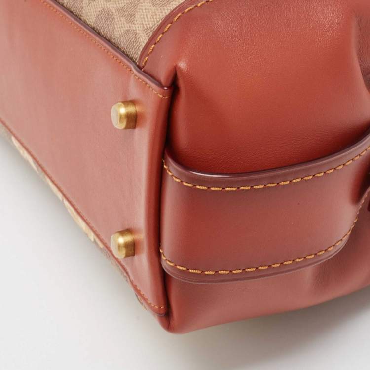 Pre Owned Coach Beige/Brown Signature Prairie Floral Canvas and Leather Edie 31 Satchel