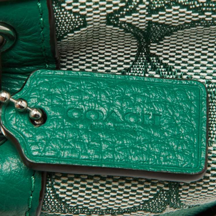 Pre Owned Coach Green Signature Canvas and Leather Mini Dempsey Bucket Bag 