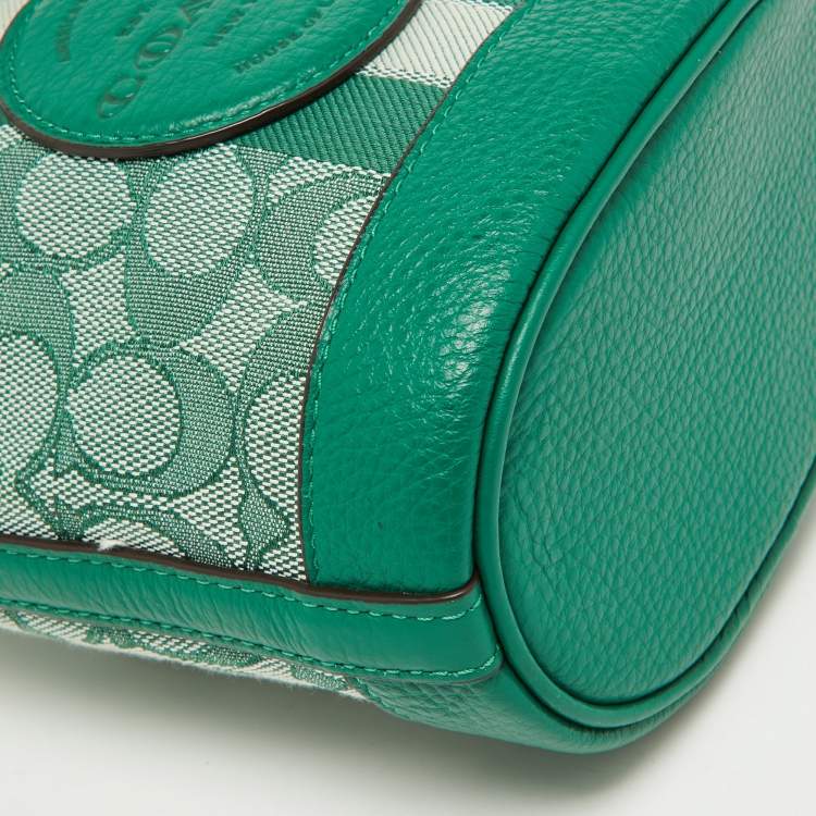Pre Owned Coach Green Signature Canvas and Leather Mini Dempsey Bucket Bag 