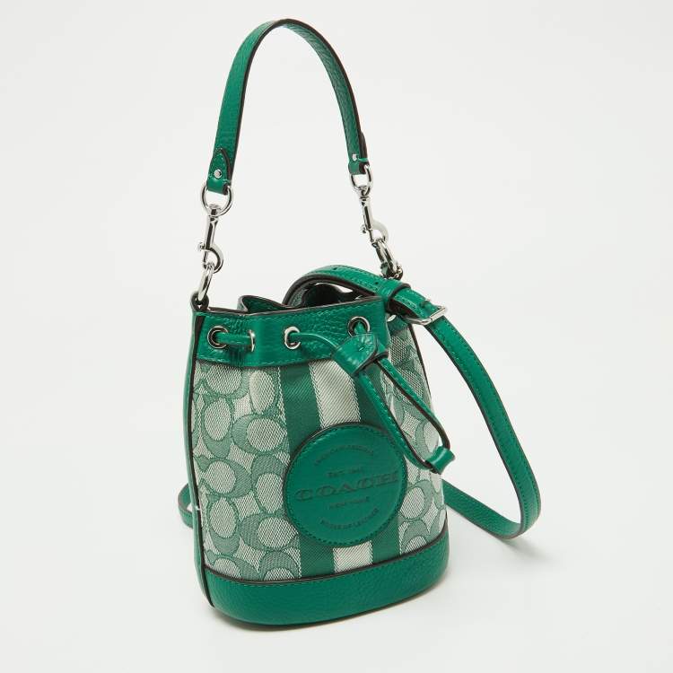 Pre Owned Coach Green Signature Canvas and Leather Mini Dempsey Bucket Bag 