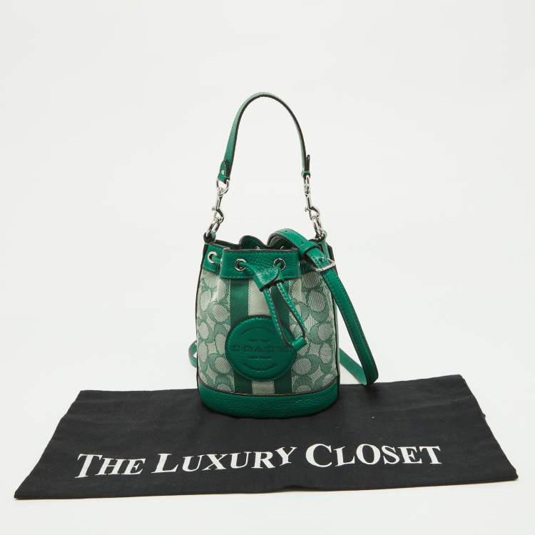 Pre Owned Coach Green Signature Canvas and Leather Mini Dempsey Bucket Bag 