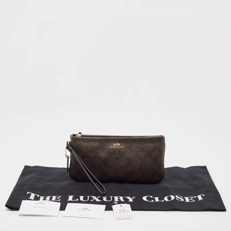 Pre Owned Coach Brown Signature Coated Canvas Zip Wristlet Wallet