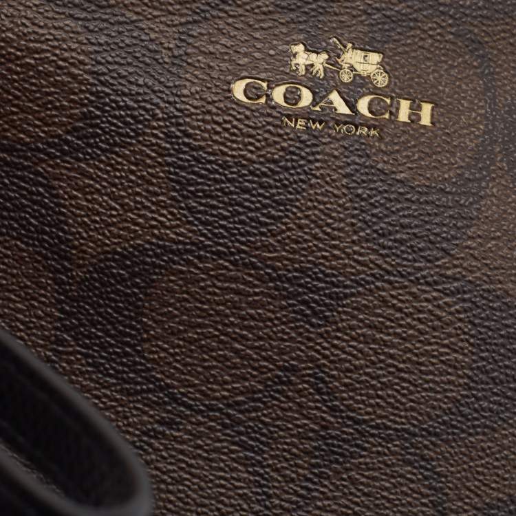 Pre Owned Coach Brown Signature Coated Canvas Zip Wristlet Wallet