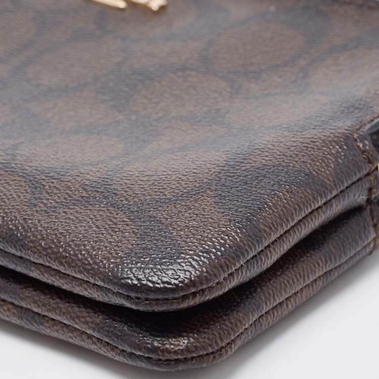 Pre Owned Coach Brown Signature Coated Canvas Double Zip Wristlet