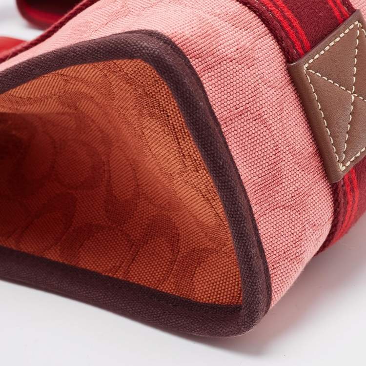Pre Owned Coach Red/Pink Signature Canvas Spin 27 Tote