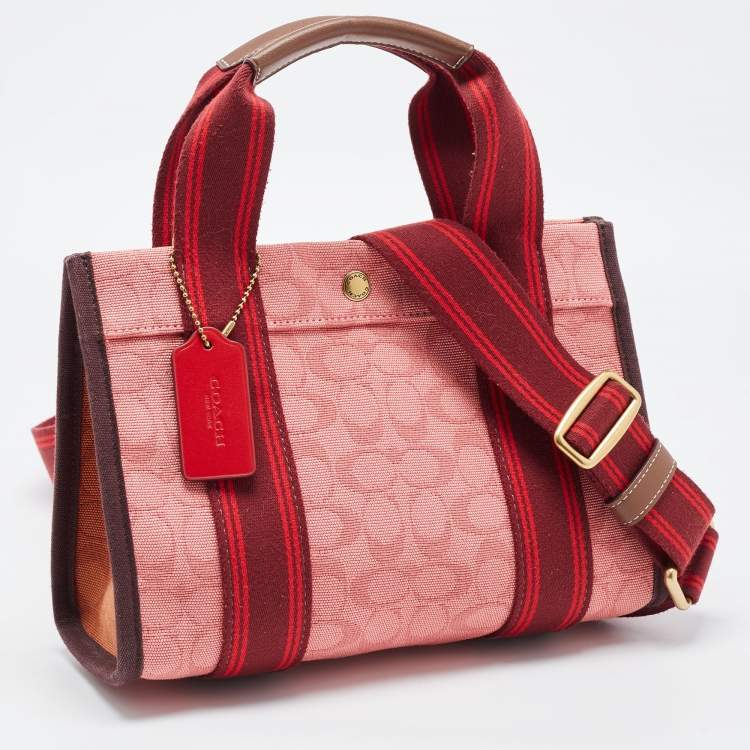 Pre Owned Coach Red/Pink Signature Canvas Spin 27 Tote