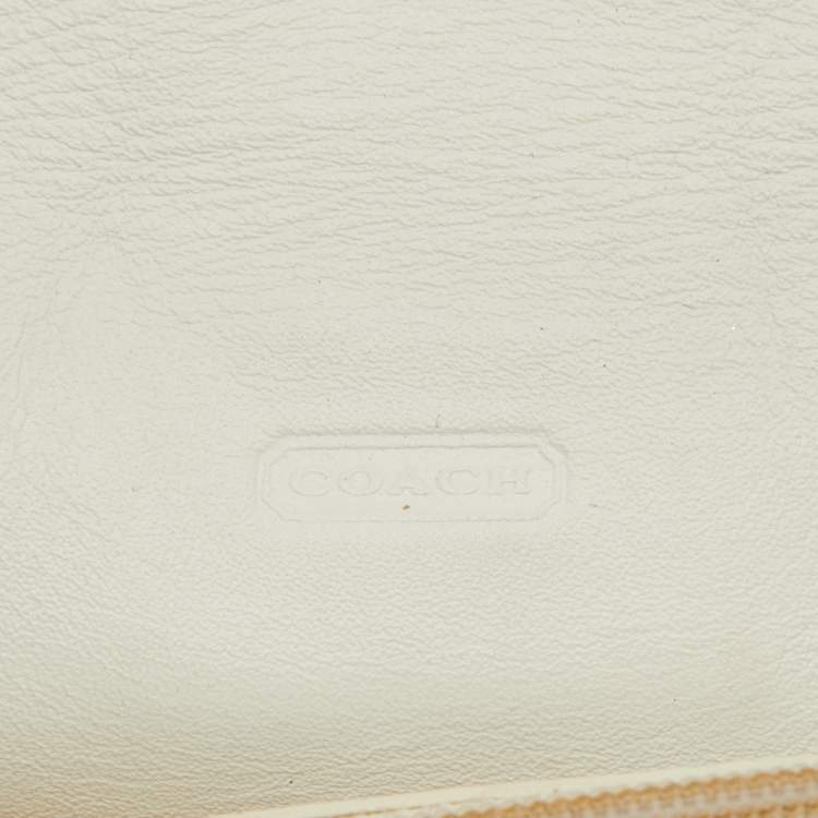 Pre Owned Coach Beige/White Signature Canvas and Leather Buckle Detail Continental Wallet
