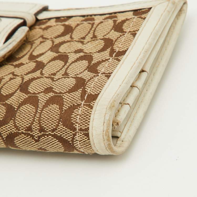 Pre Owned Coach Beige/White Signature Canvas and Leather Buckle Detail Continental Wallet