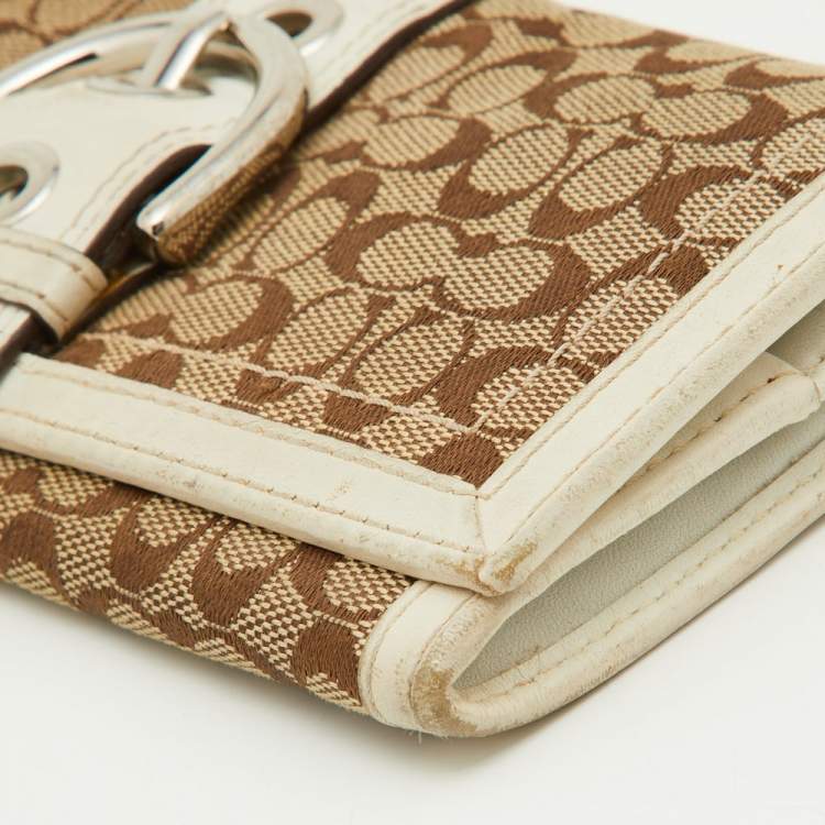 Pre Owned Coach Beige/White Signature Canvas and Leather Buckle Detail Continental Wallet