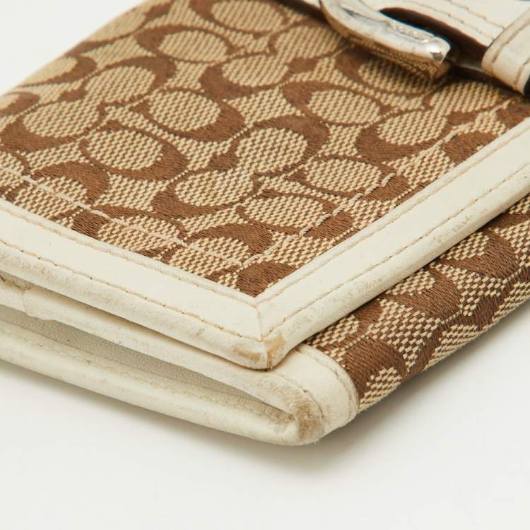 Pre Owned Coach Beige/White Signature Canvas and Leather Buckle Detail Continental Wallet