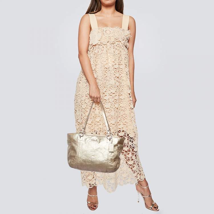 Pre Owned Coach Gold Signature Embossed Leather East West Gallery Tote