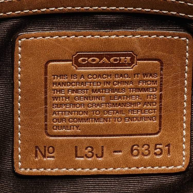 Pre Owned Coach Beige/Brown Signature Canvas and Leather Soho Hobo