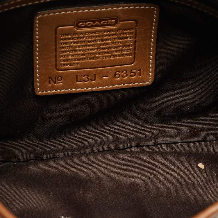 Pre Owned Coach Beige/Brown Signature Canvas and Leather Soho Hobo