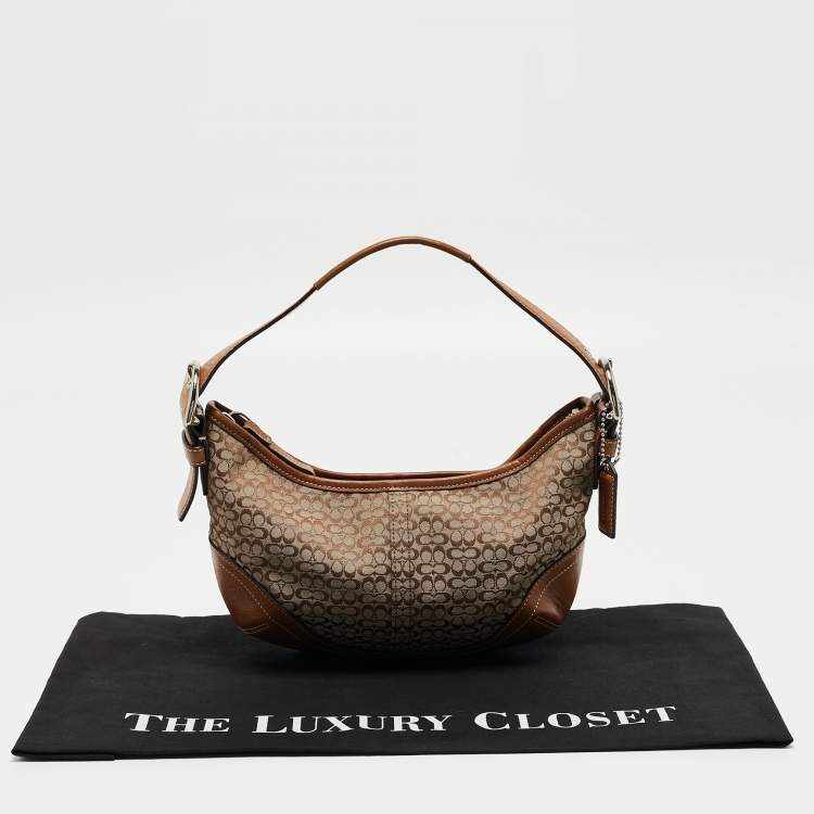 Pre Owned Coach Beige/Brown Signature Canvas and Leather Soho Hobo