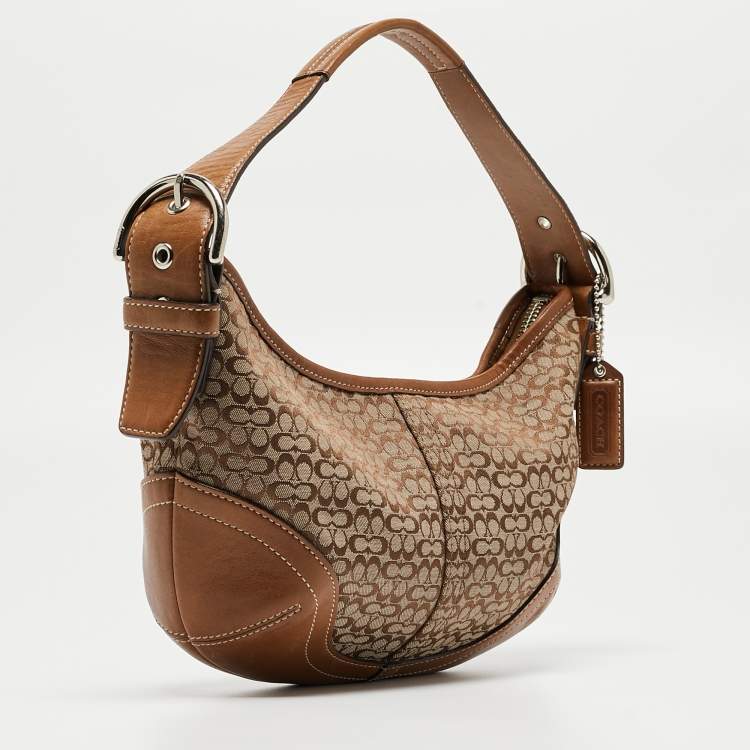 Pre Owned Coach Beige/Brown Signature Canvas and Leather Soho Hobo