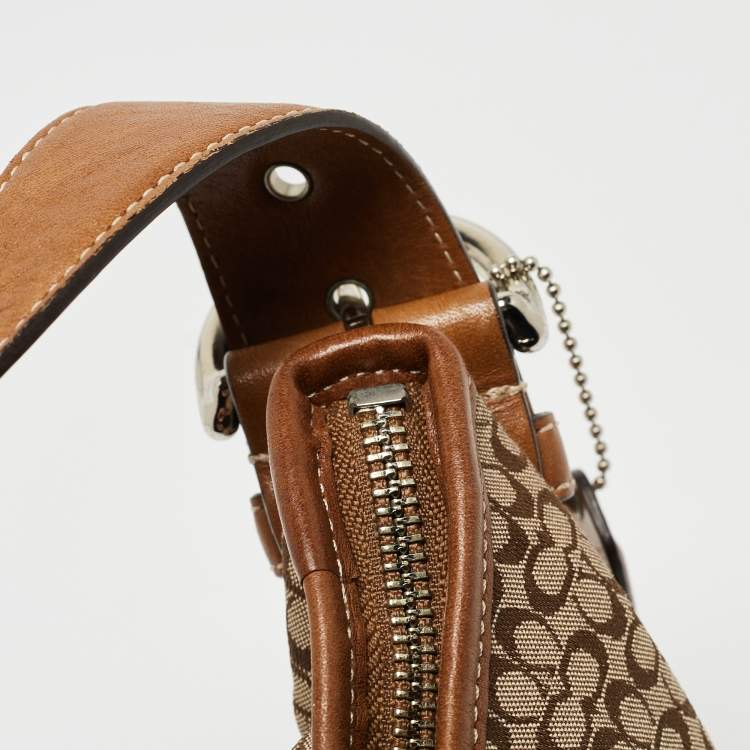 Pre Owned Coach Beige/Brown Signature Canvas and Leather Soho Hobo