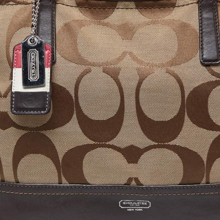 Pre Owned Coach Brown/Beige Signature Canvas and Leather Hamptons Weekend Tote