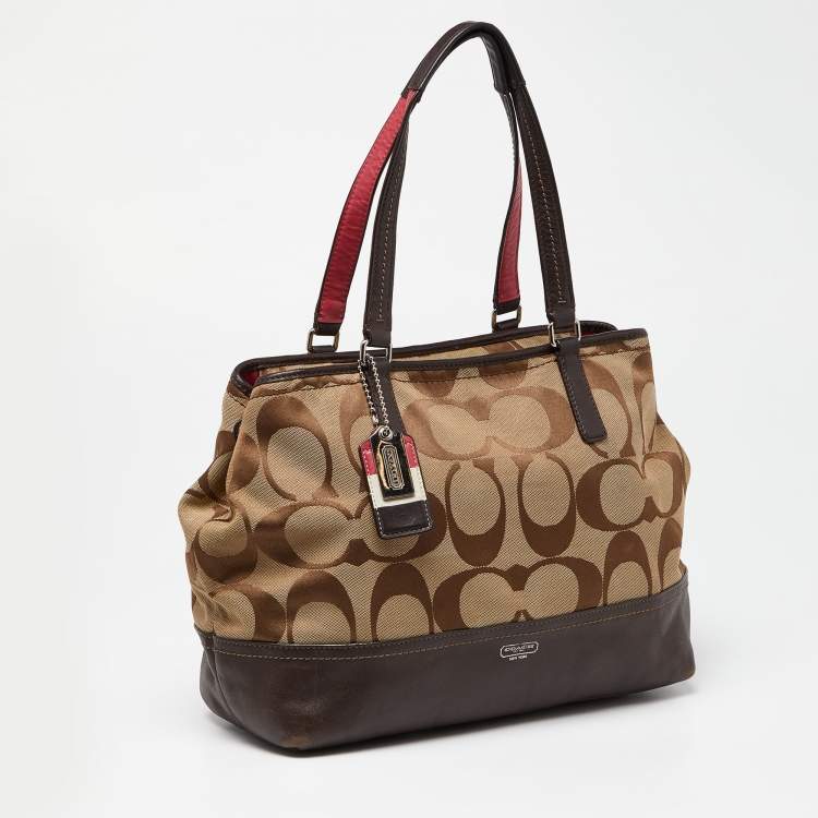 Pre Owned Coach Brown/Beige Signature Canvas and Leather Hamptons Weekend Tote