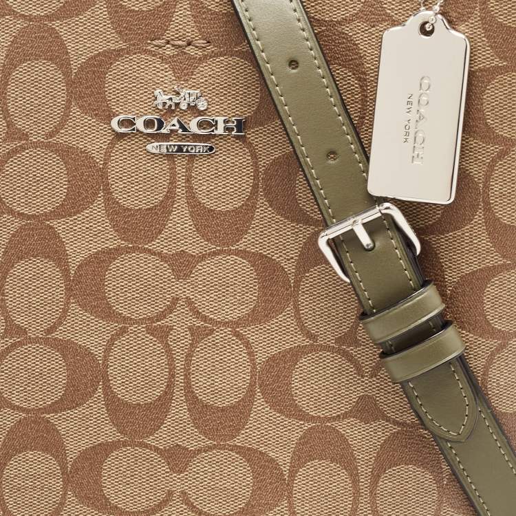 Pre Owned Coach Beige/Green Signature Coated Canvas and Leather Town Bucket Bag