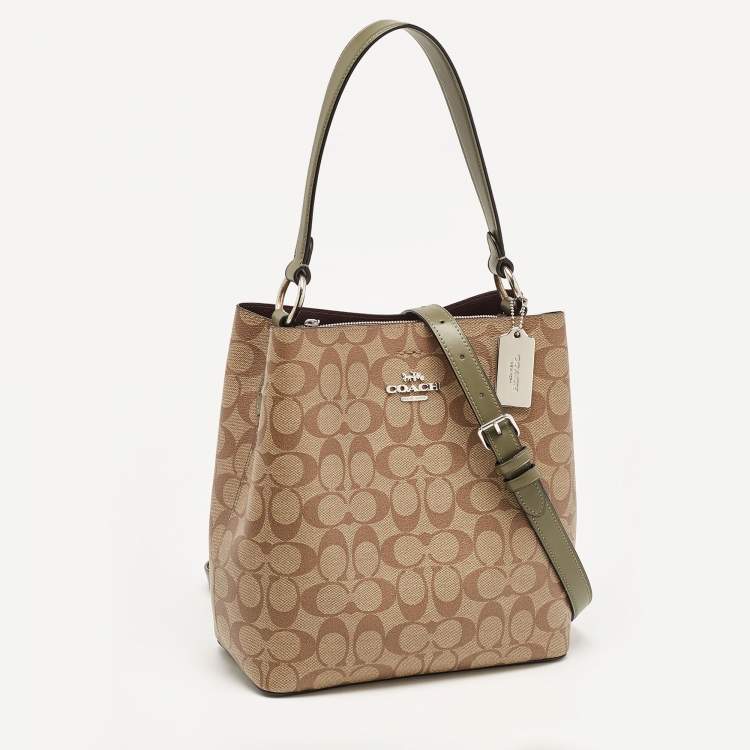 Pre Owned Coach Beige/Green Signature Coated Canvas and Leather Town Bucket Bag