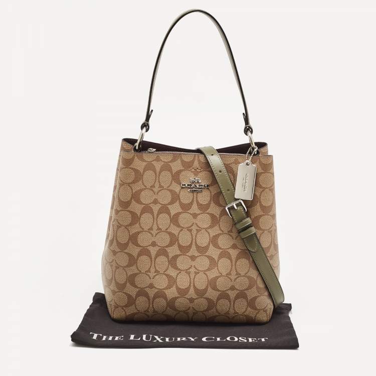 Pre Owned Coach Beige/Green Signature Coated Canvas and Leather Town Bucket Bag