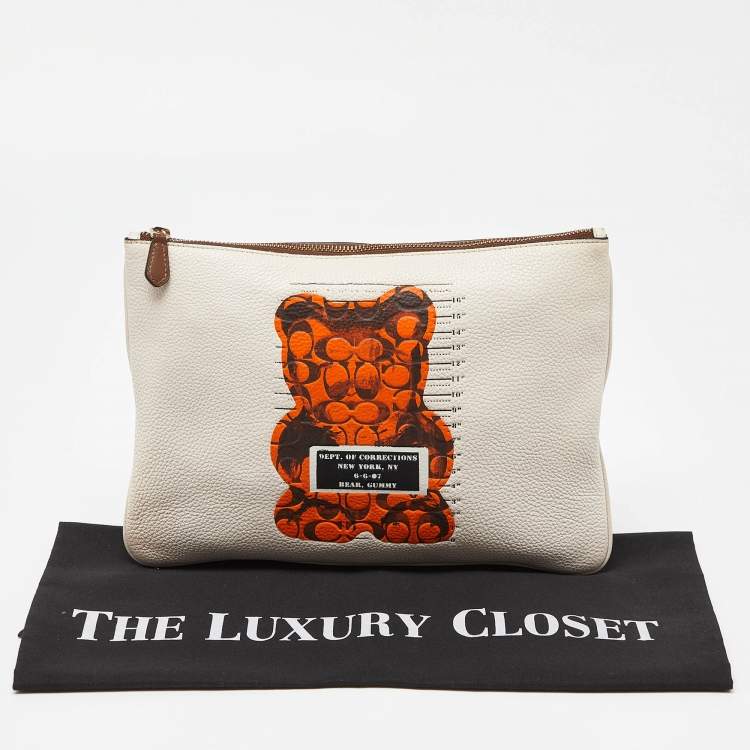 Pre Owned Coach Cream/Orange Signature Leather Gummy Bear Zip Pouch