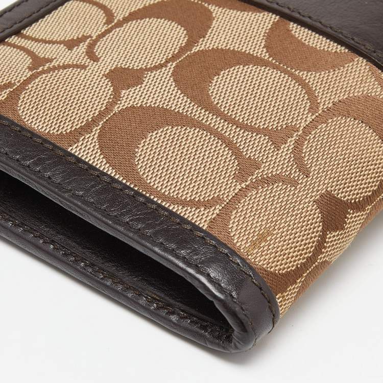 Pre Owned Coach Brown/Beige Signature Canvas and Leather Zip Wristlet Pouch