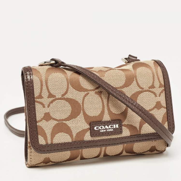Pre Owned Coach Brown/Beige Signature Canvas Mini Crossbody Bag