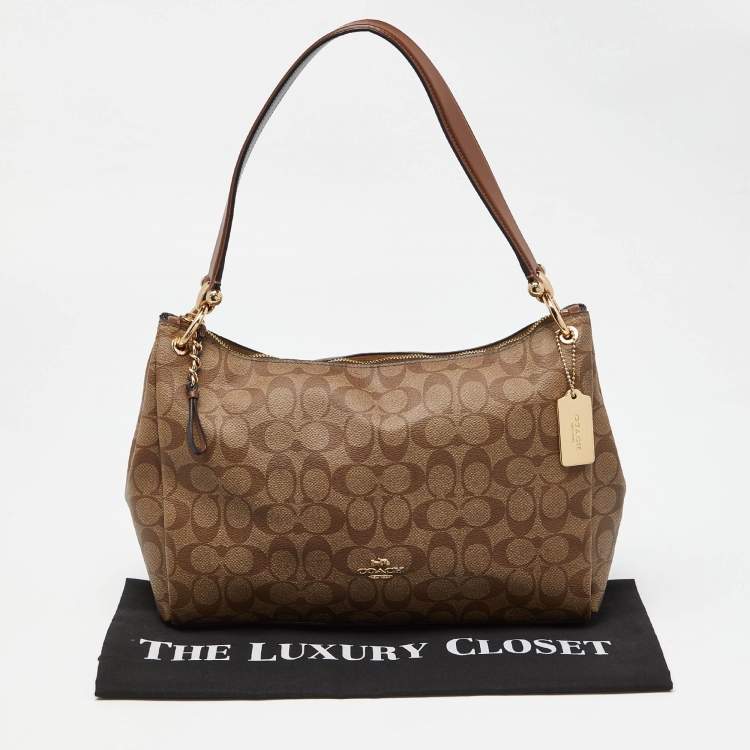 Pre Owned Coach Brown/Beige Signature Coated Canvas and Leather Mia Shoulder Bag