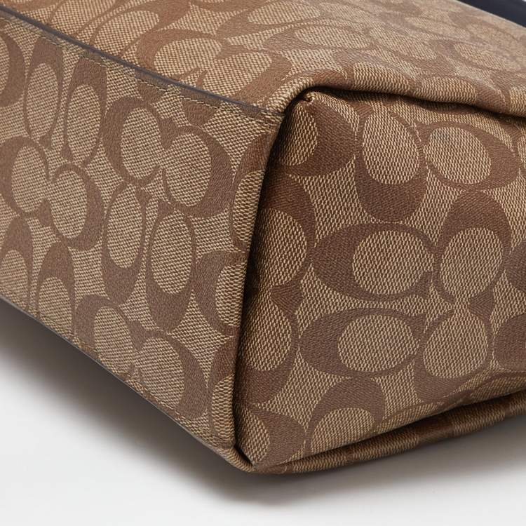 Pre Owned Coach Brown/Beige Signature Coated Canvas and Leather Mia Shoulder Bag
